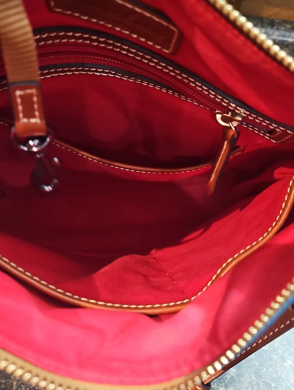 Dooney & Bourke Blue Pebble Leather Crossbody Bag with Brown Trim